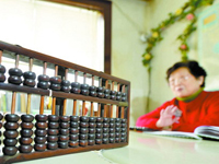 珠算已成非遗 “如意算盘”如今有谁还在打？